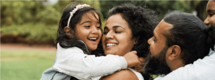 Photo of a South Asian family